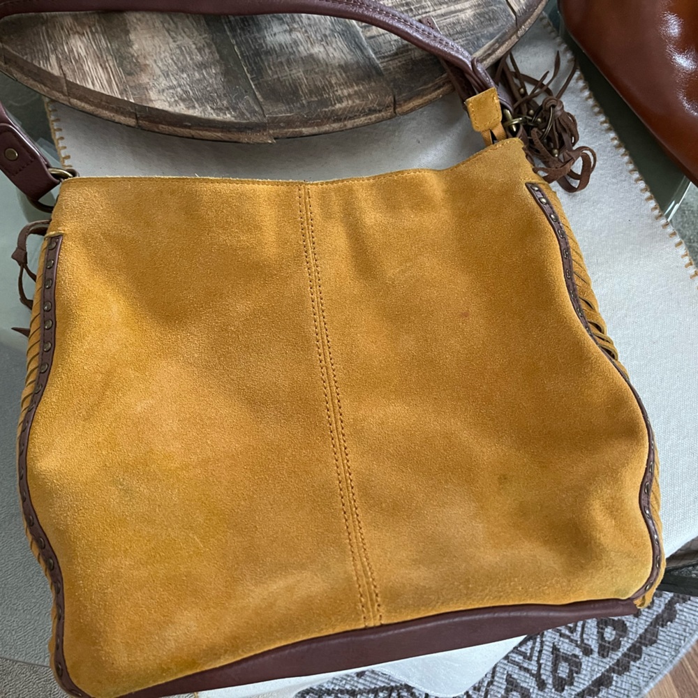 The Sak yellow leather purse. Large size with brown leather strap.